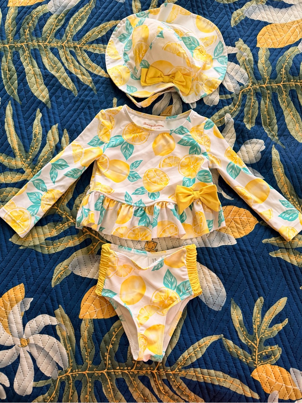 Tommy Bahama rash guard, bikini bottom & sun hat.  24 months.